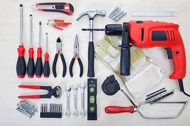 Various tools on the white wood surface
